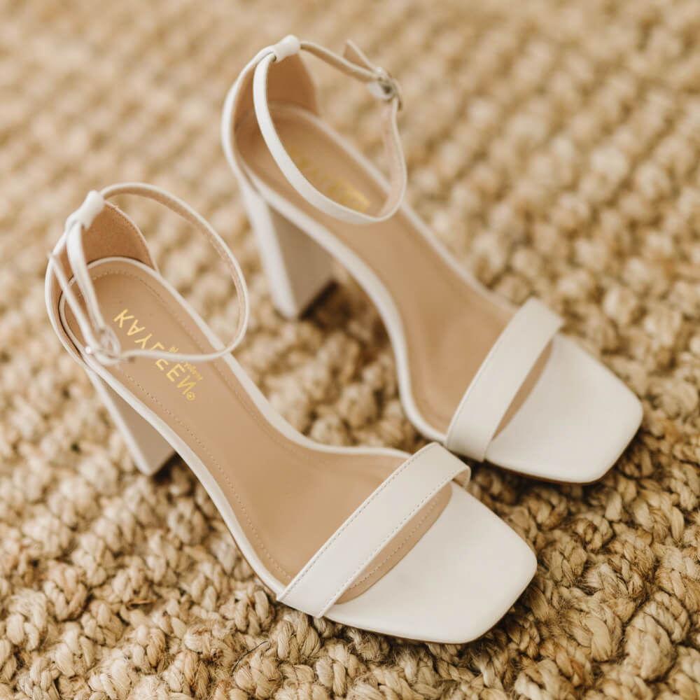 heeled sandals on a carpet