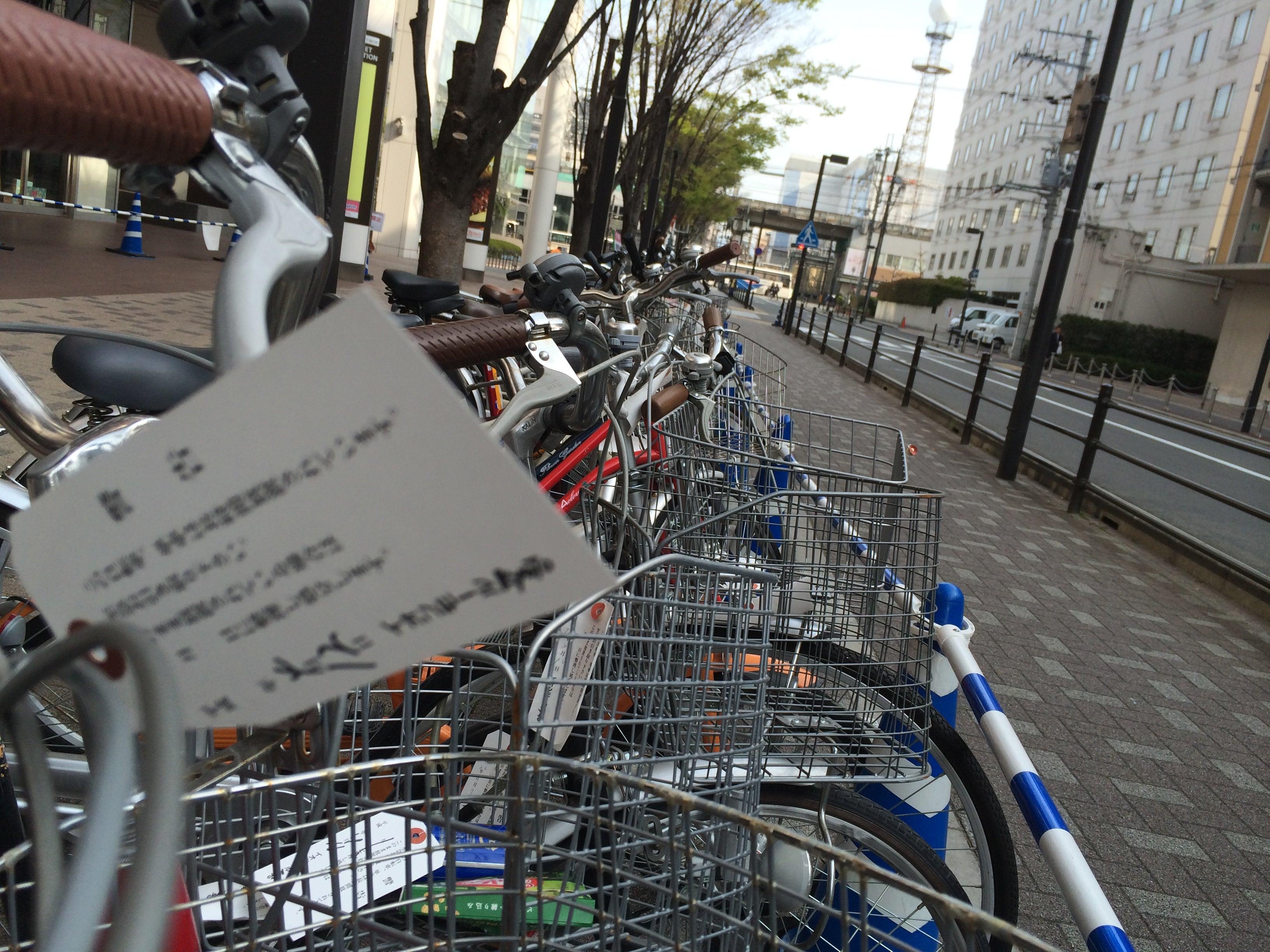 Bicycle valet parking in front of a shopping mall in downtown Kyoto