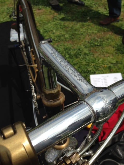 Metal filigree chosen to look like John Wayne's pistol on the bicycle handlebars