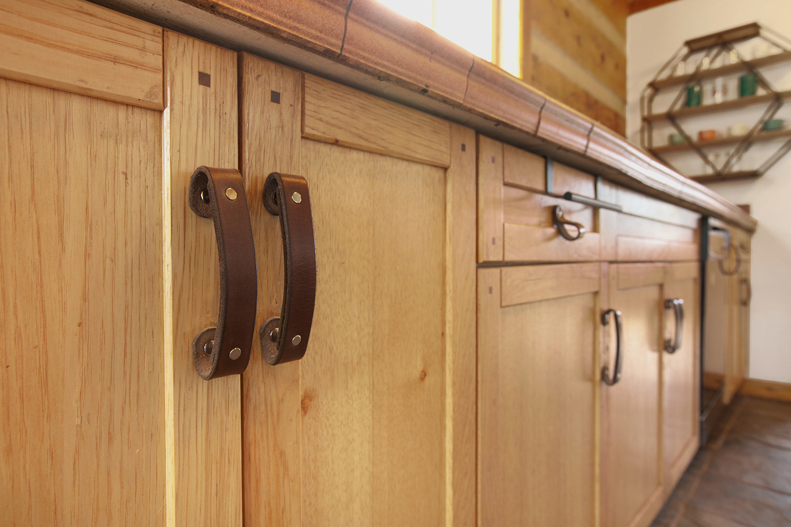 Leather drawer pulls freshen up old cabinets