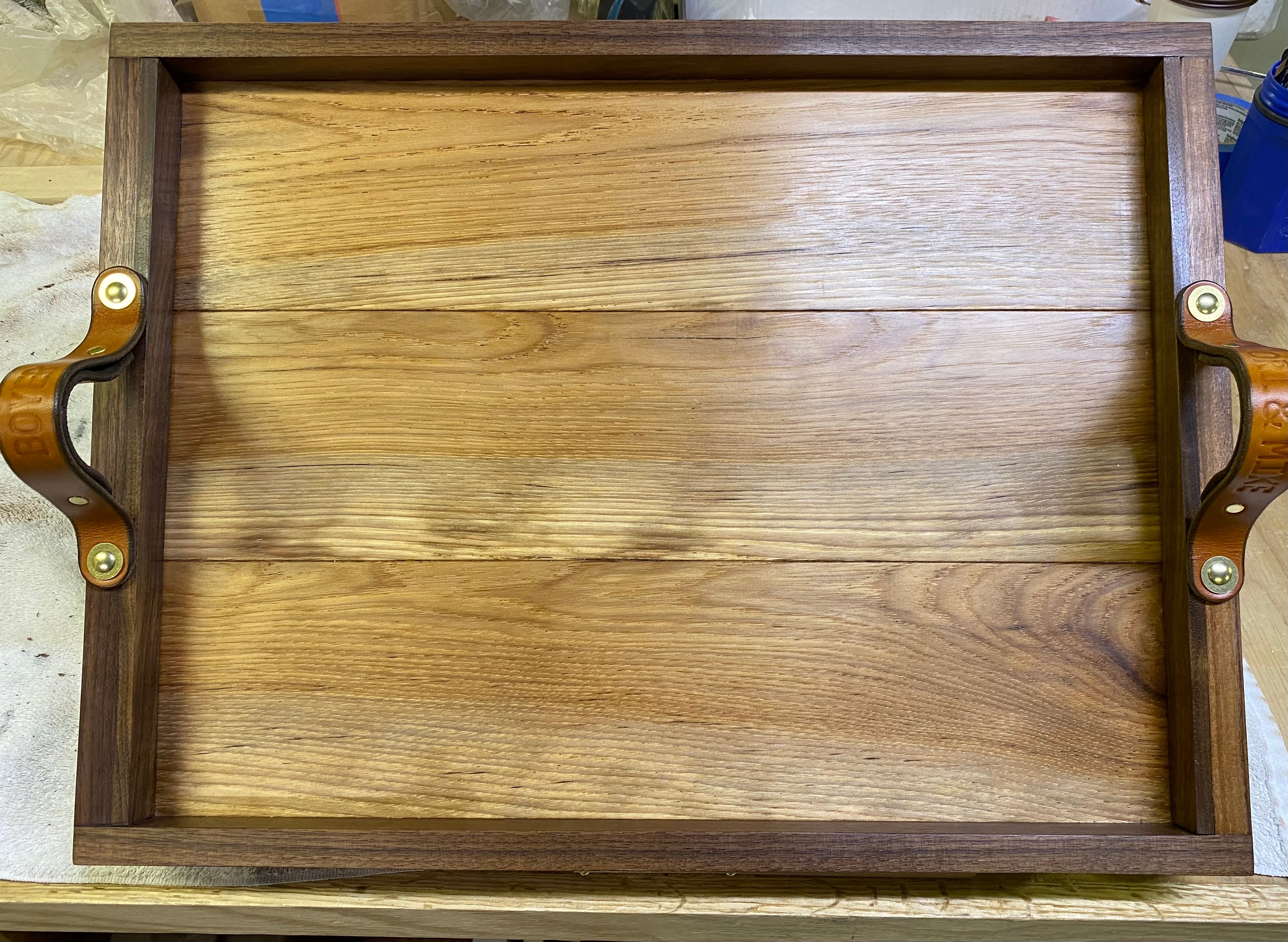 https://cdn.shopify.com/s/files/1/0156/2360/t/83/assets/1686802339-tilikum-honey-brass-used-as-handles-on-a-handmade-walnut-and-hickory-wood-tray-with-labels-by-chuck-boyd.jpgw1024?v=1686802340