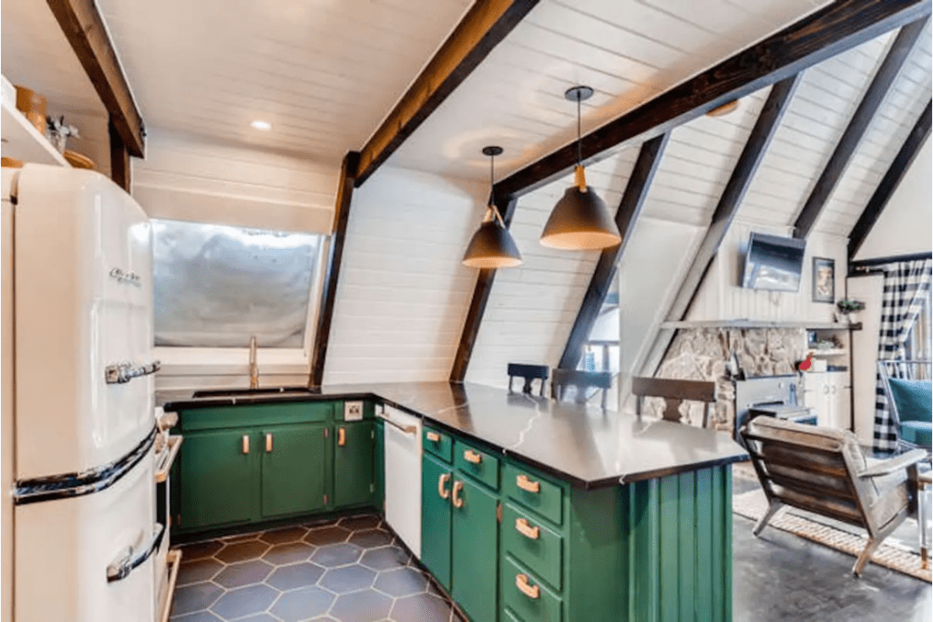 Kelly Green AirBnB Kitchen with Natural Tilikum Leather Handles