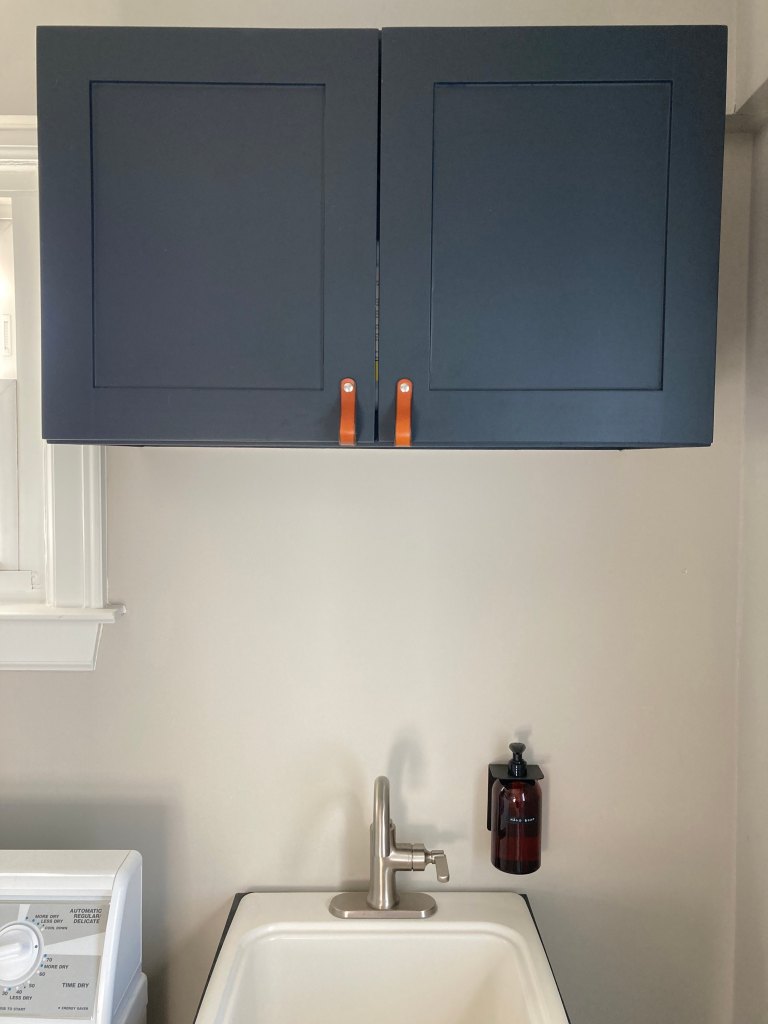 Deep Gray Blue Laundry Room Cabinets with Honey Leather Lovejoy Handles