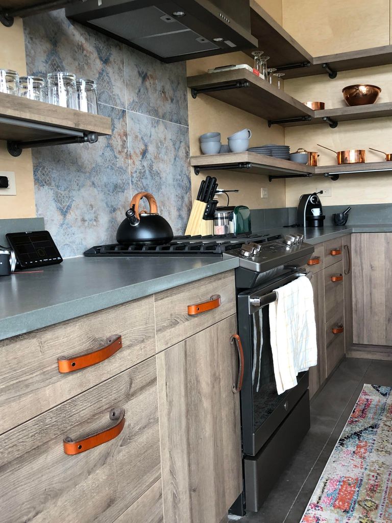 Mountain Cabin Kitchen with Verdigris Blue Light Gray Wood and Honey Tilikum Large Leather Handles
