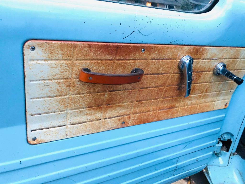 Honey Leather Tilikum Handle Installed on Vintage Truck Door with Rust and Aqua Blue and White