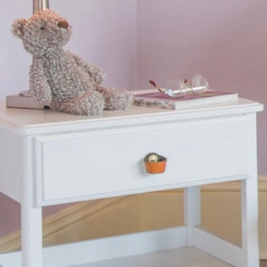 Hawthorne Honey Small Leather Handle Installed as a Fremont Loop on a Nursery Side Table