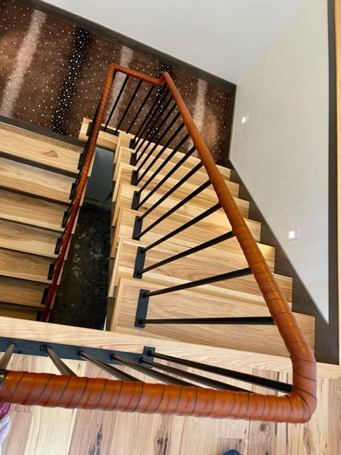 leather wrapped stair bannister rail with 3/4" overlap