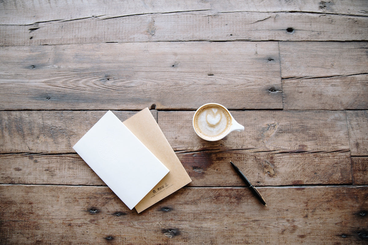 Journal and coffee