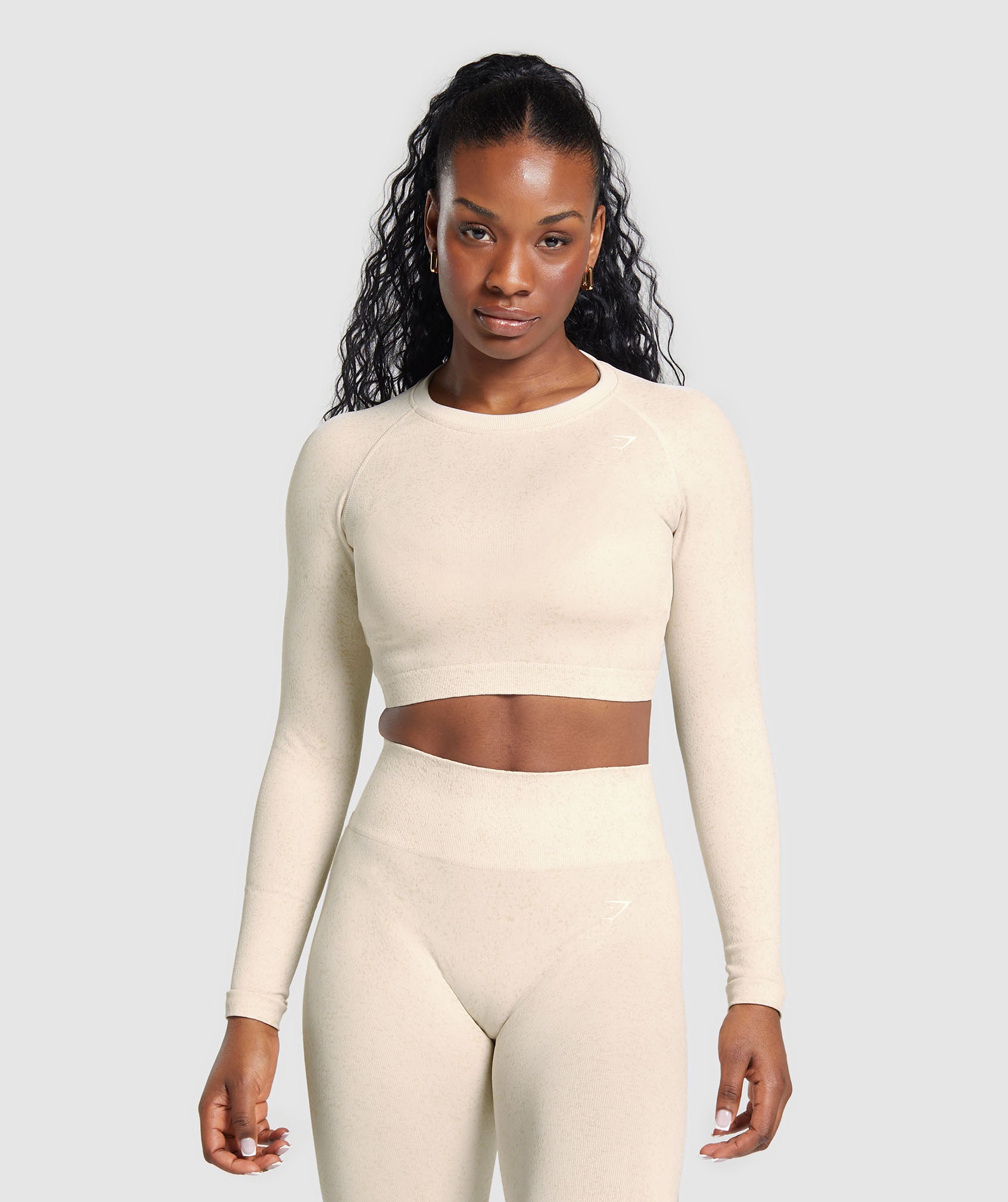 Adapt Fleck Seamless Long Sleeve Crop Top en Coconut White está agotado