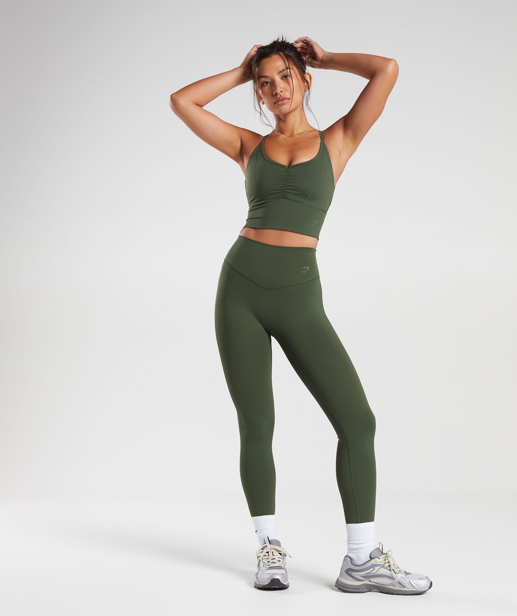 Buy Gaiam women pullon plain leggings olive Online