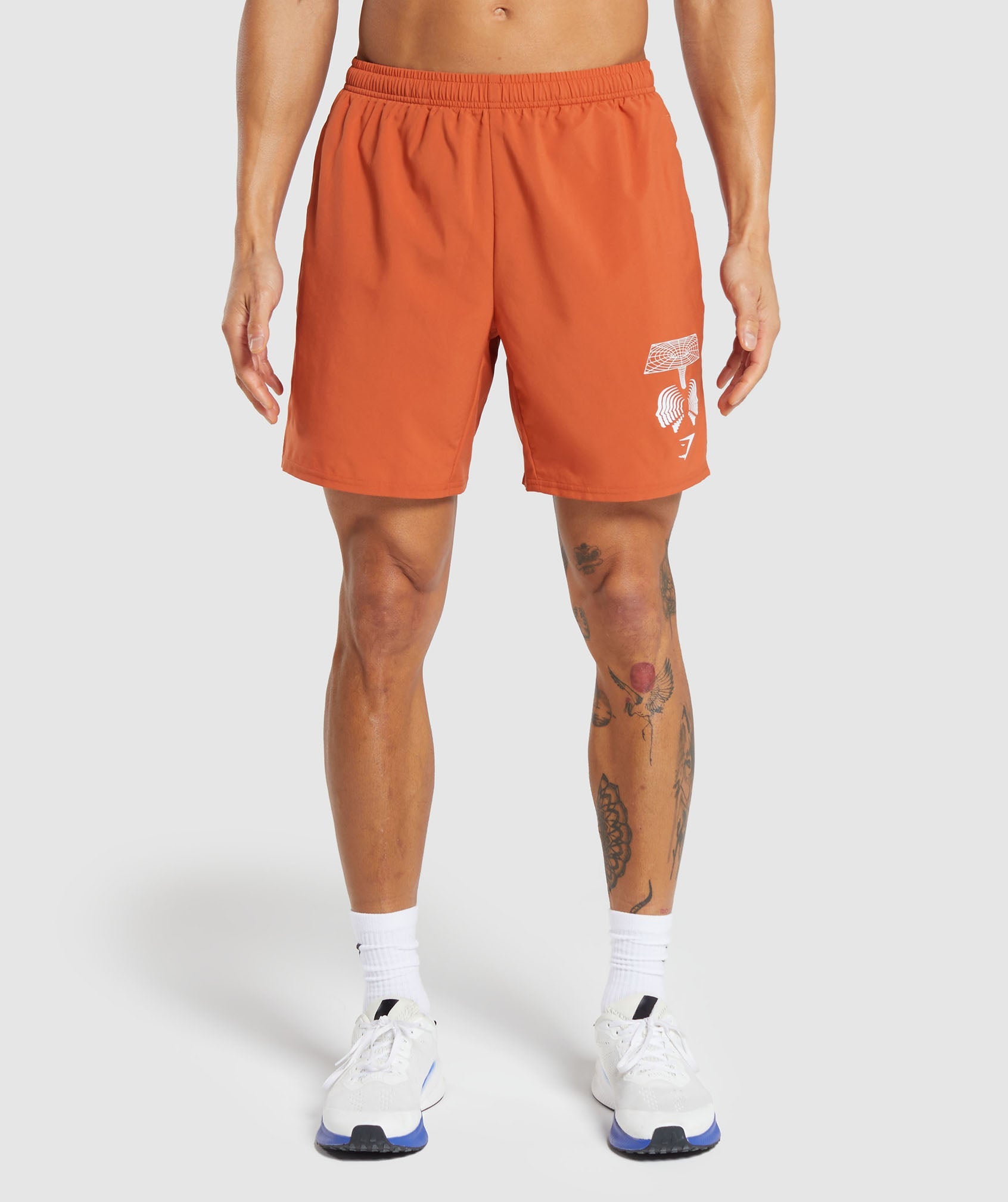 Hybrid Wellness 7" Shorts in Rust Orange - view 1