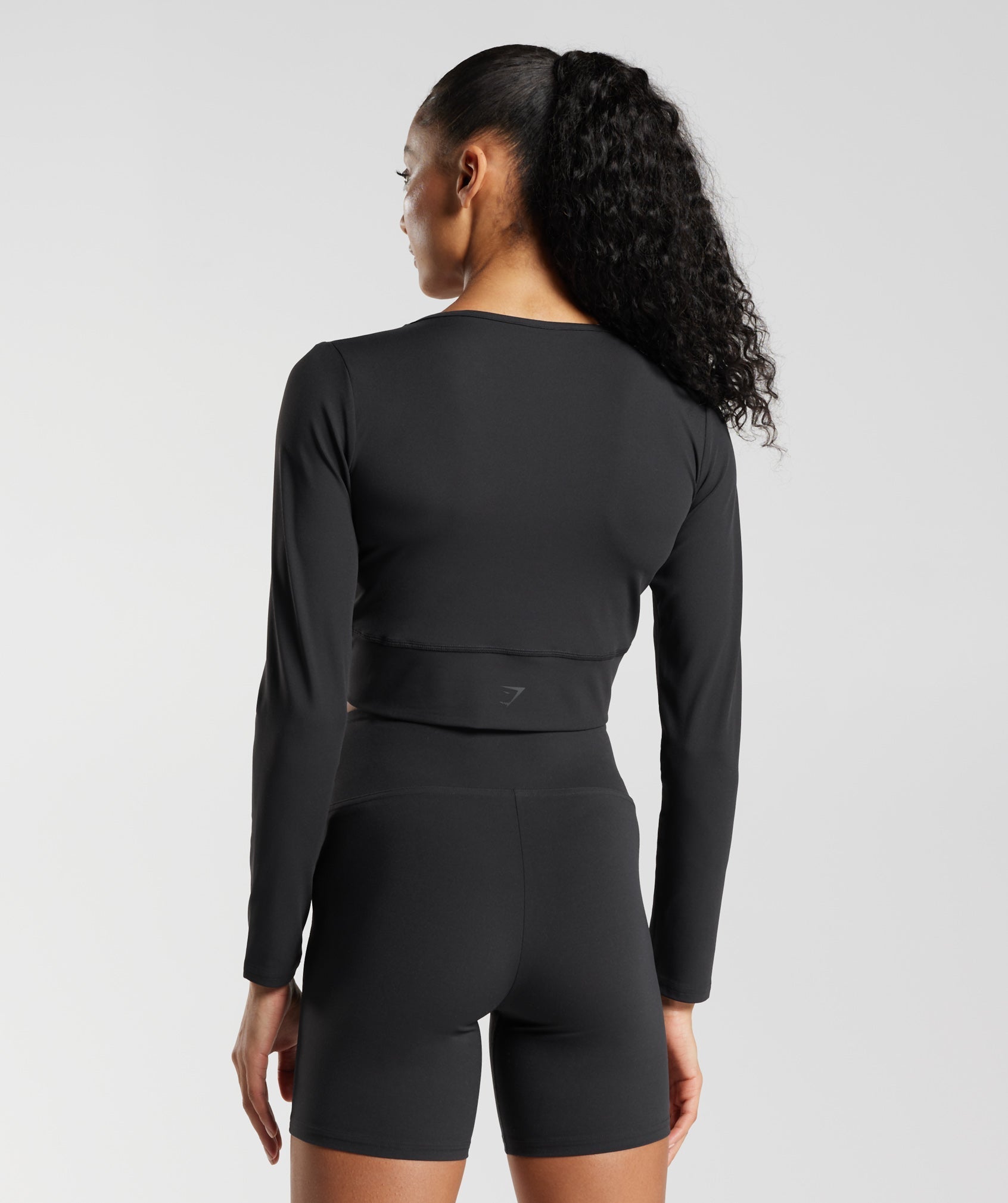 Crossover Long Sleeve Crop Top in Black - view 3