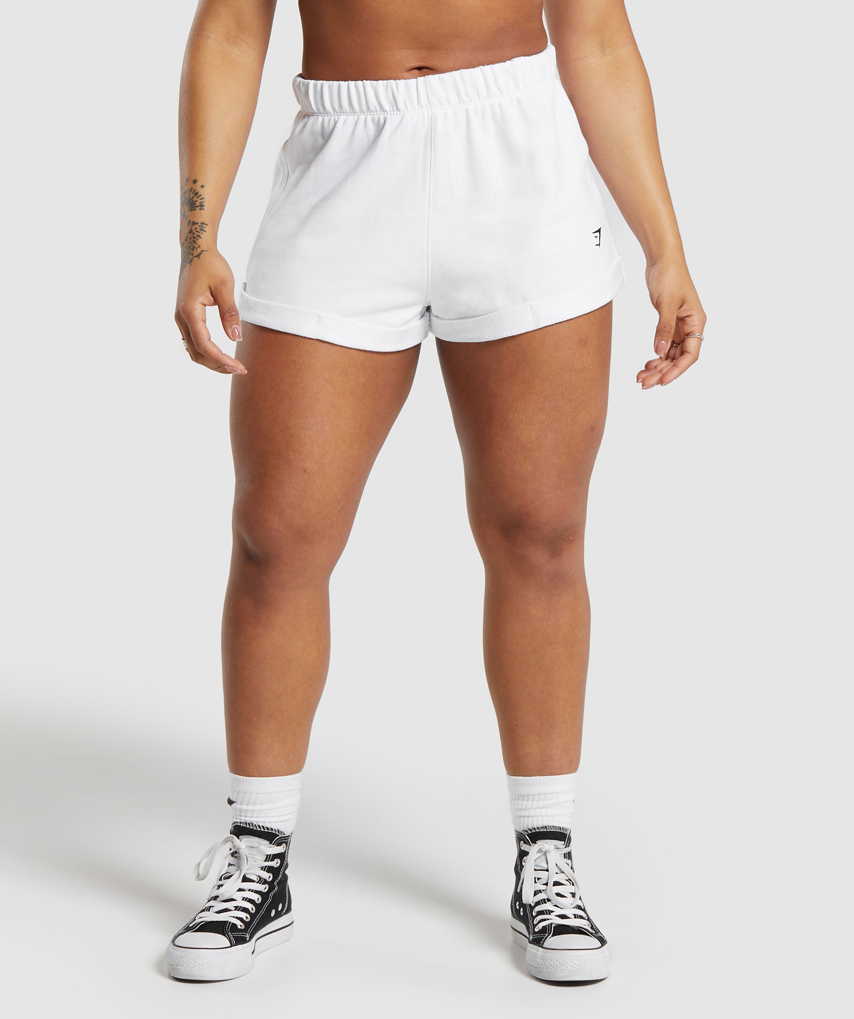 Lifting Loose Shorts in White