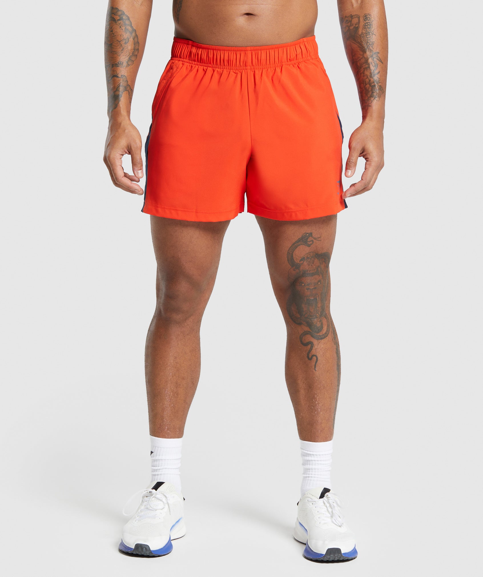 Sport 5" Shorts en Electric Orange/Navy