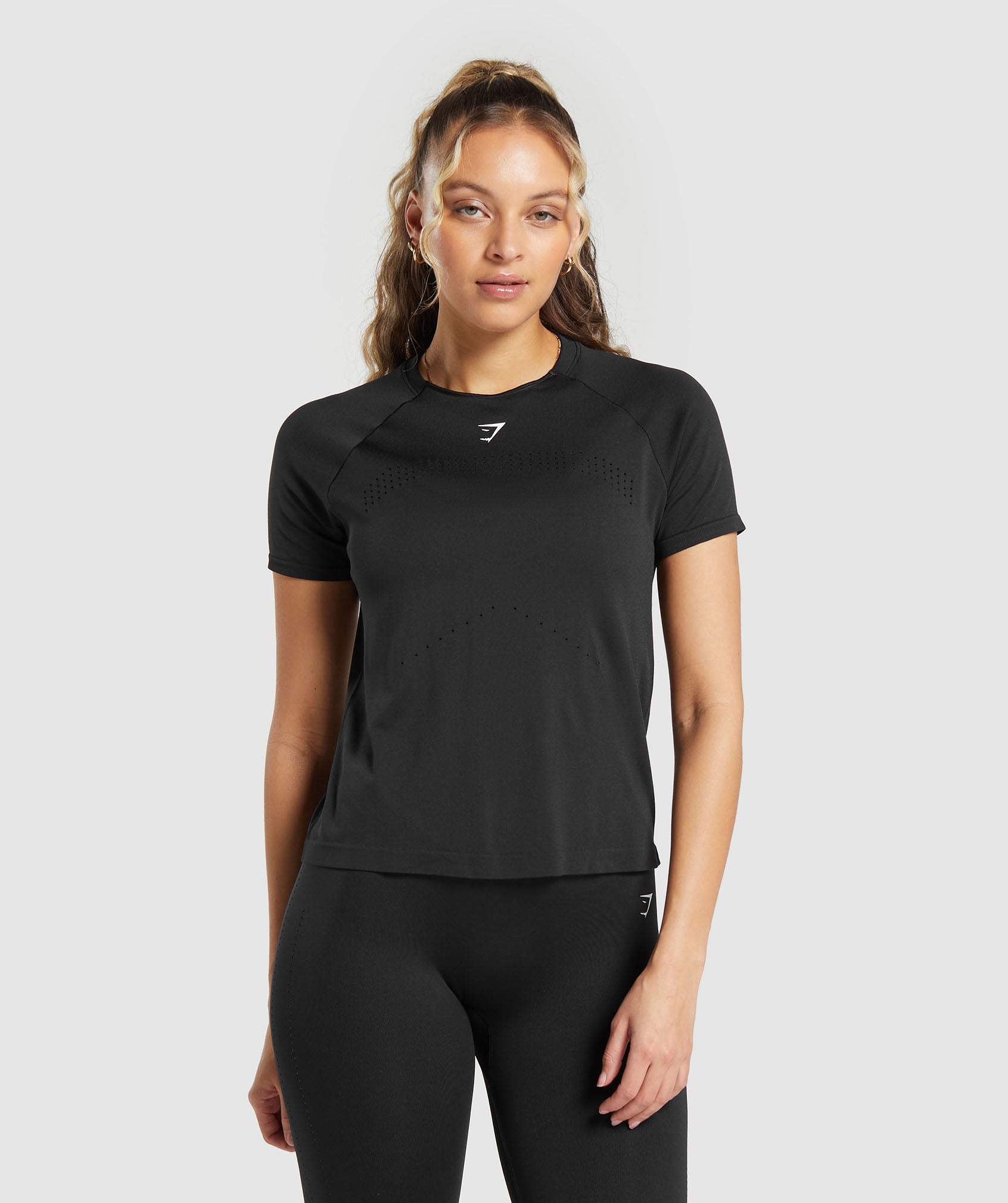 $50 - $100 Dri-FIT Yoga Short Sleeve Shirts.