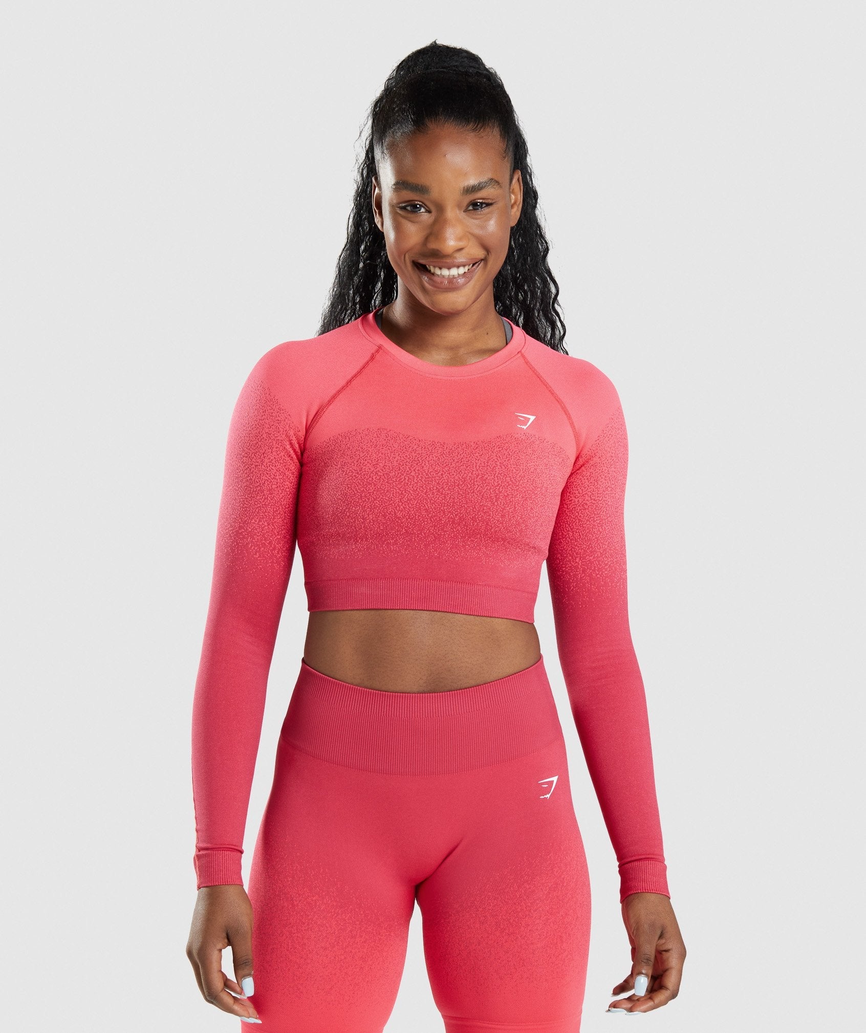 Adapt Ombre Seamless Long Sleeve Crop Top in Pink/Red - view 1