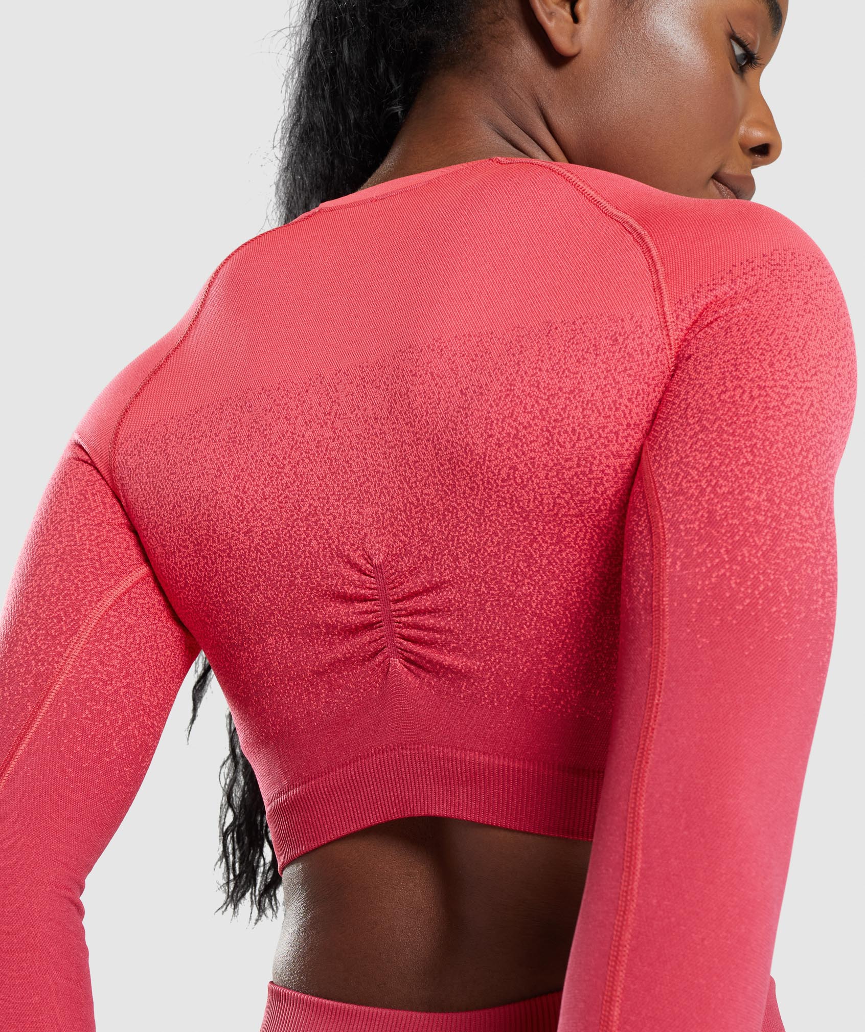Adapt Ombre Seamless Long Sleeve Crop Top in Pink/Red