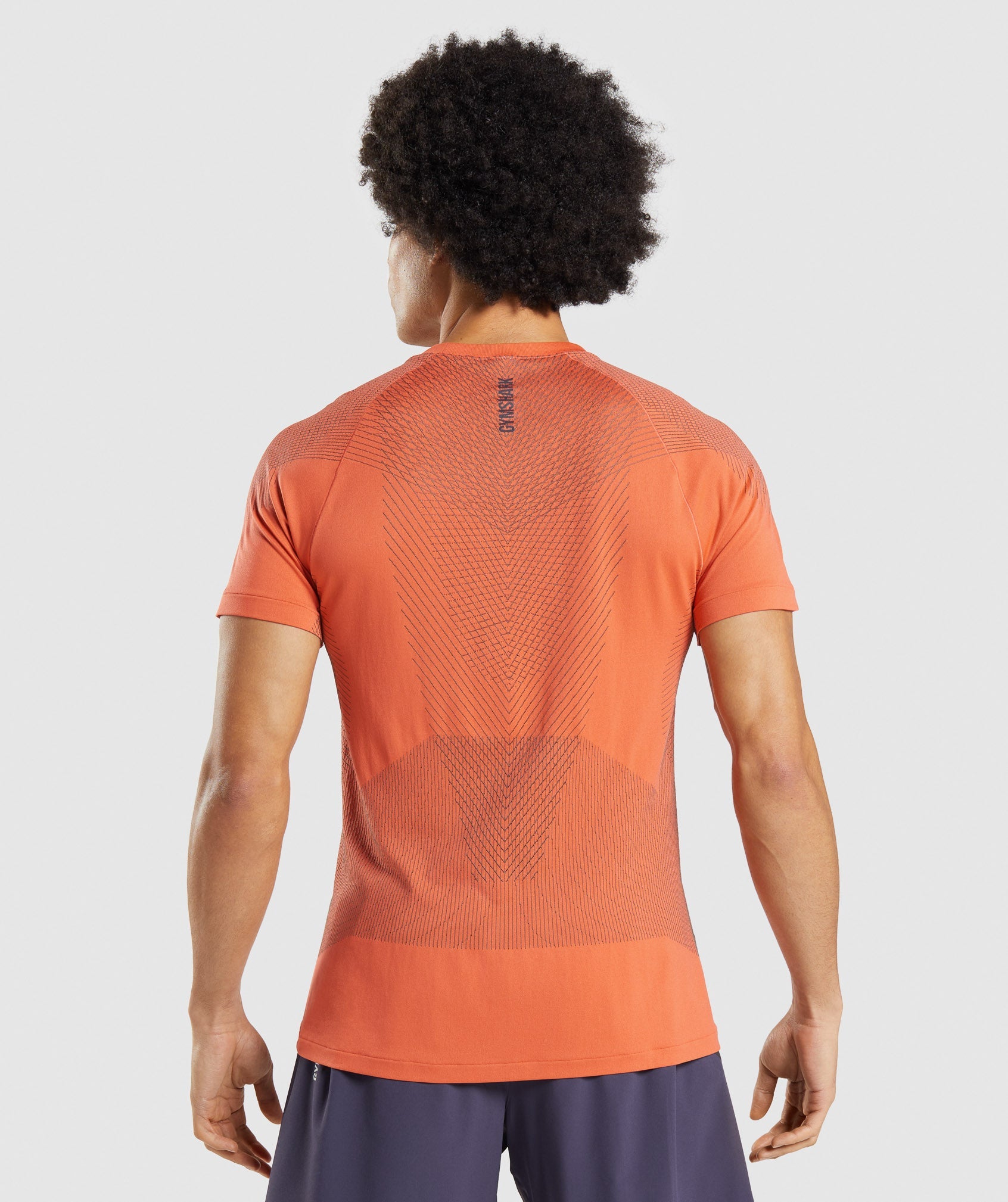Apex Seamless T-Shirt in Papaya Orange/Onyx Grey - view 2
