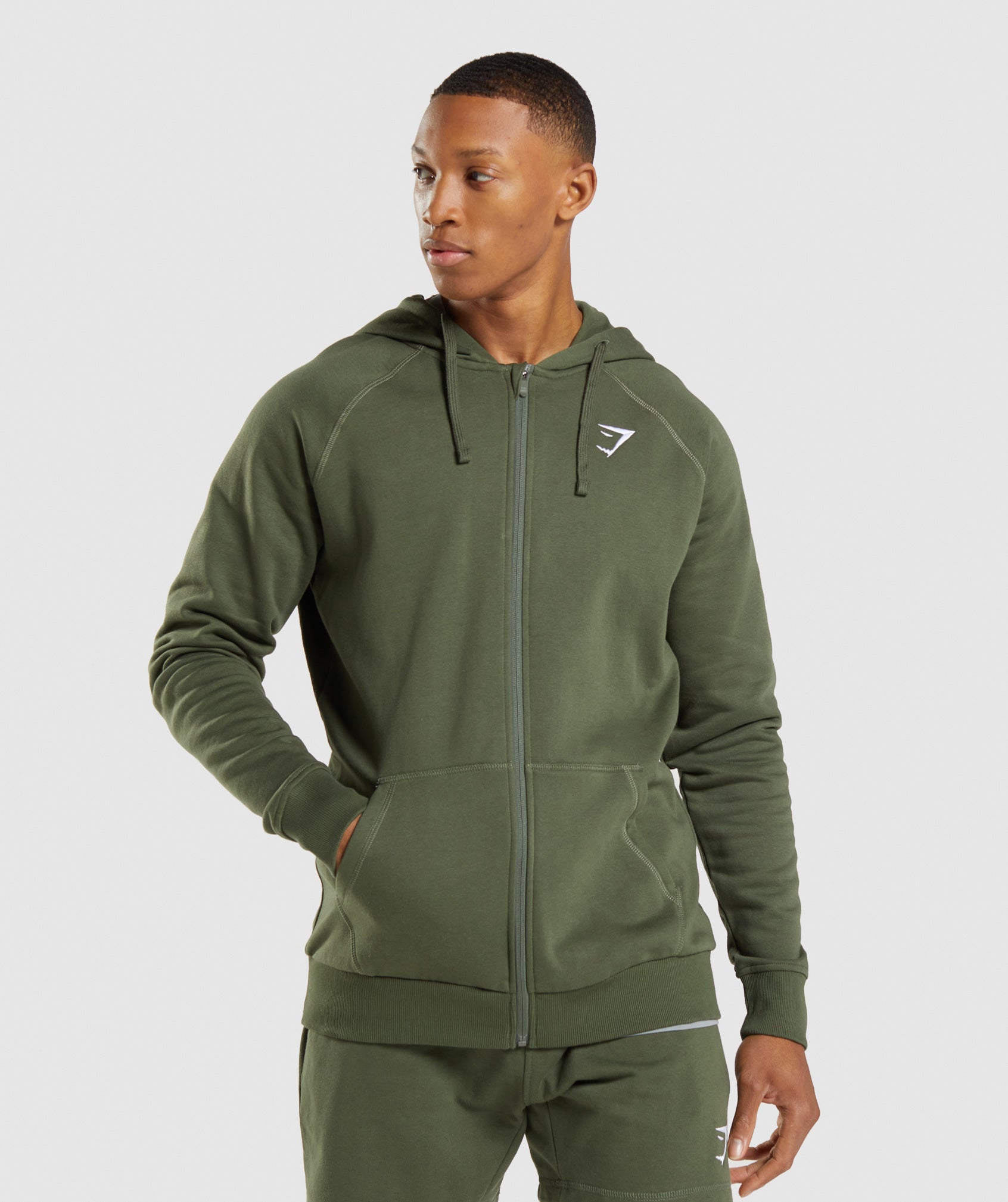 Crest Zip Up Hoodie en Core Olive está agotado