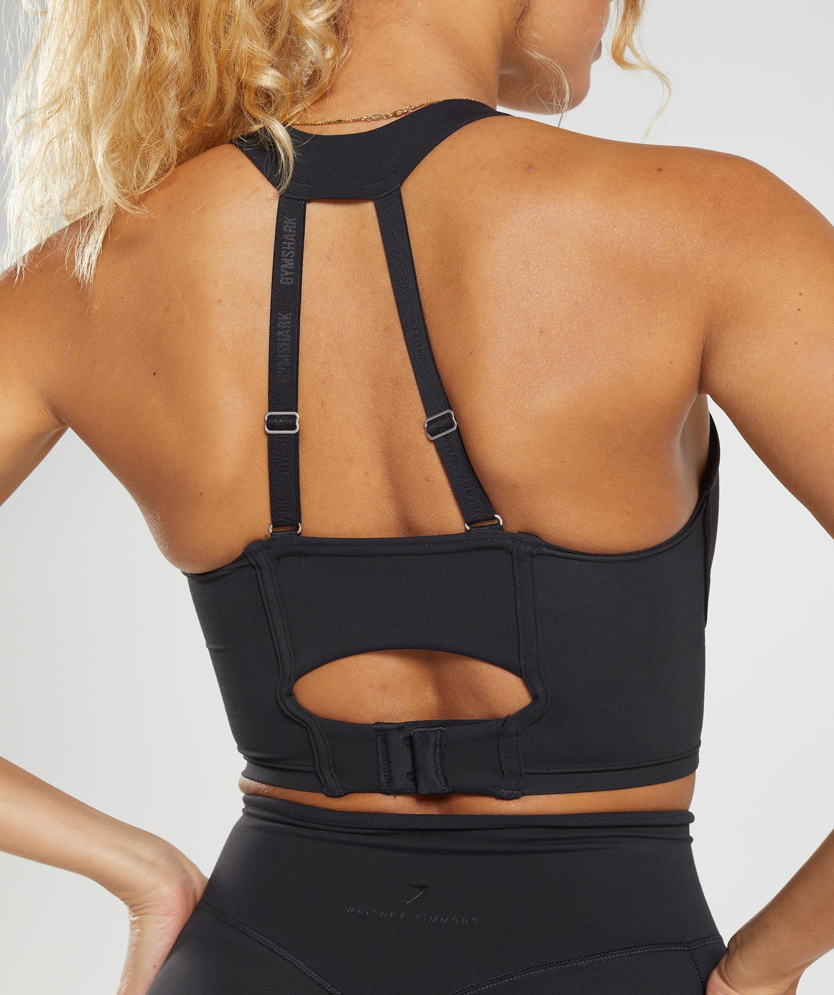 Whitney Cooling Low Impact Unlined Sports Bra in Black by Yummie