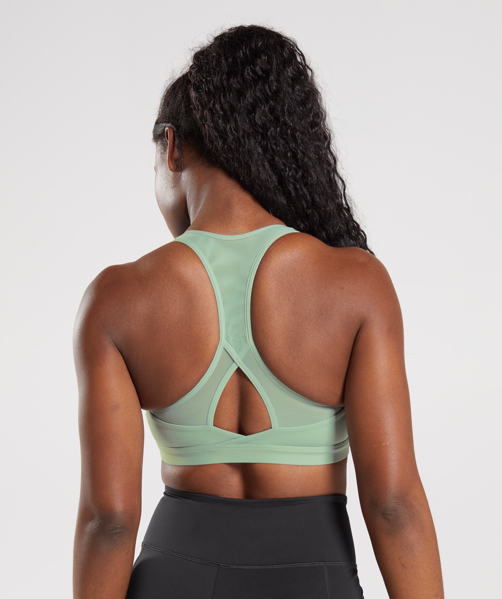 South Beach rib light support cutout sports bra in sage green