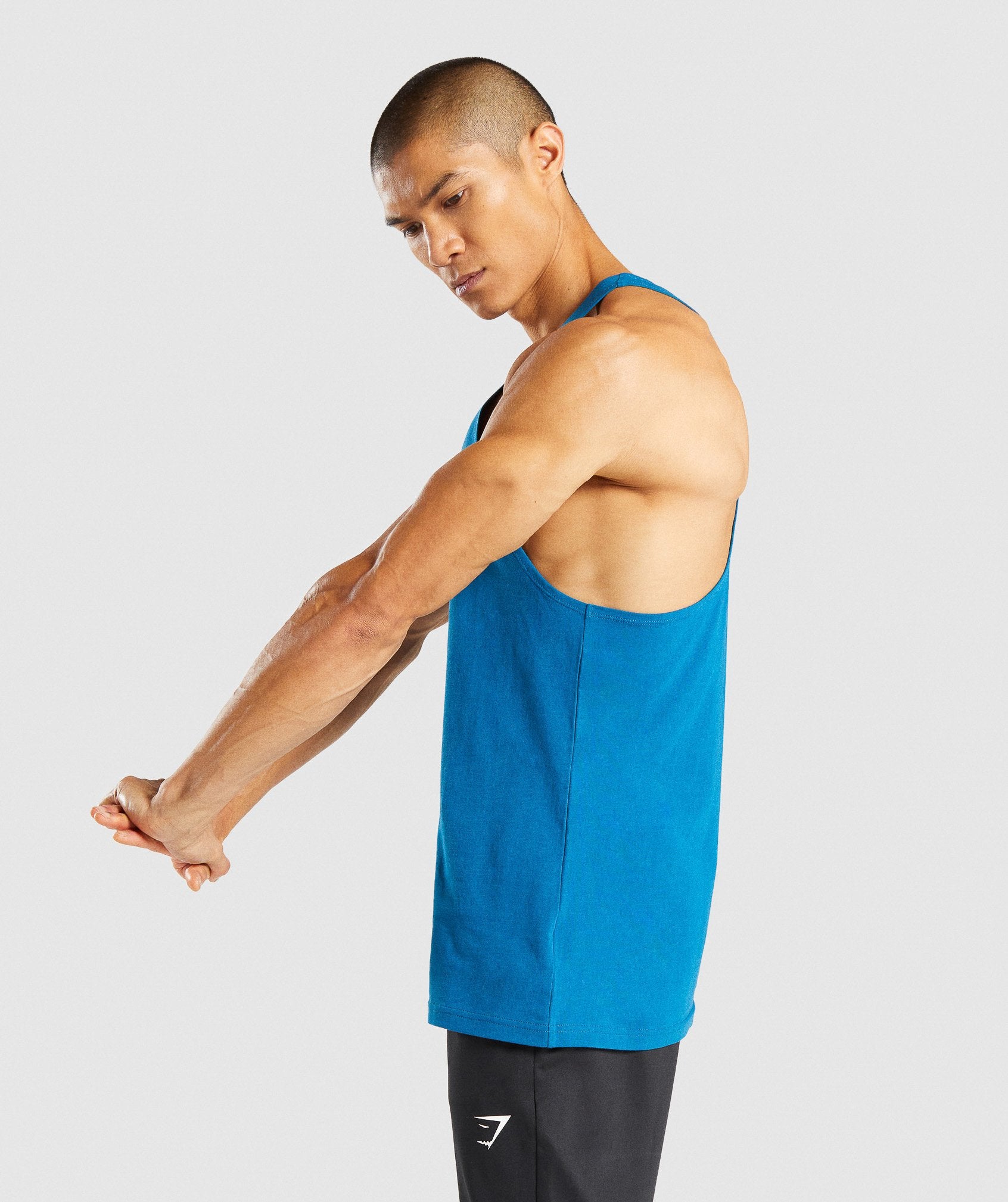 Image C shows side of model wearing Outline Stringer in Teal