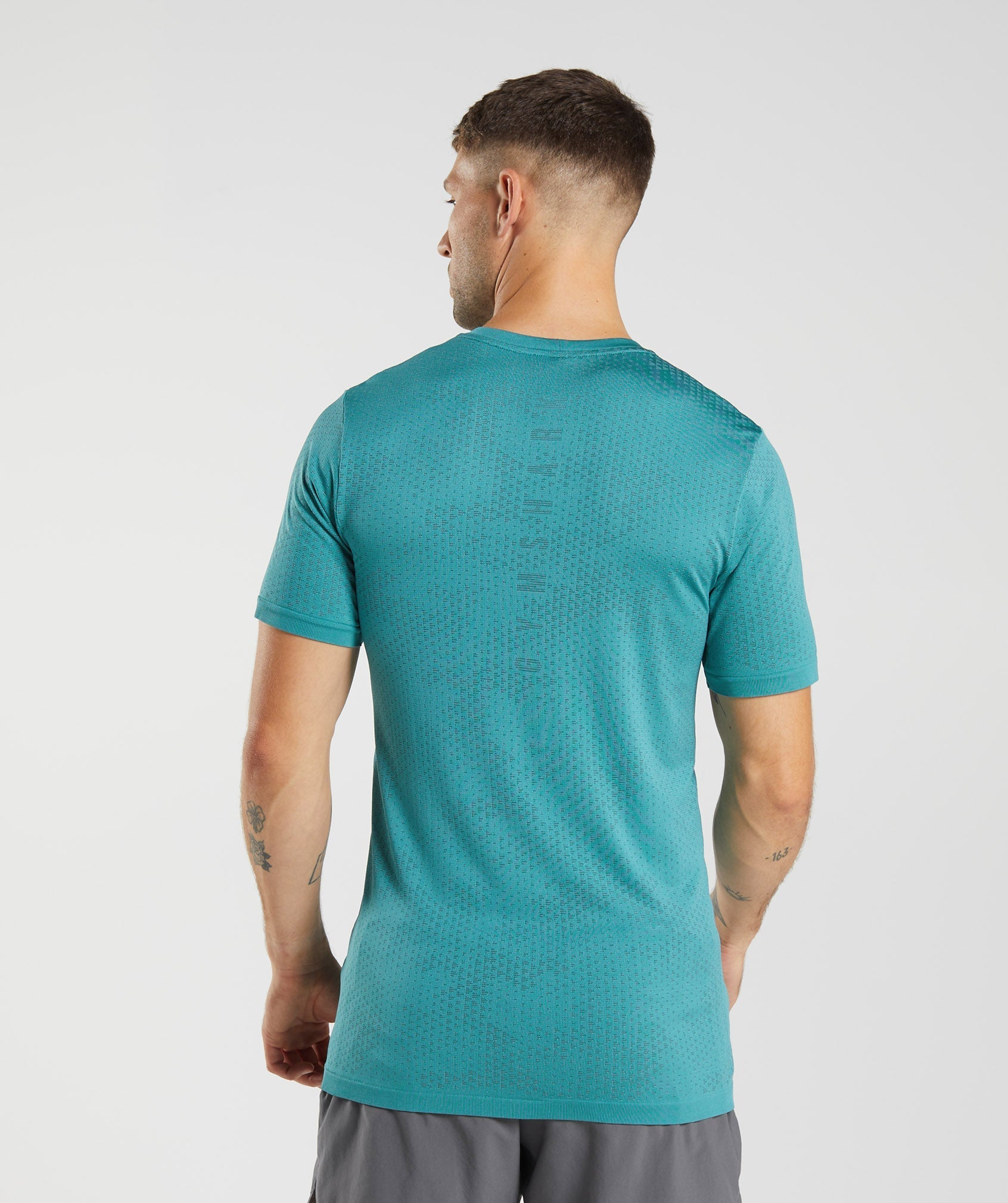 Custom Fitness Clothing Men Gym Seamless Nylon Polyester Sea Teal Marl T  Shirt - China Seamless Wear and T-Shirt price