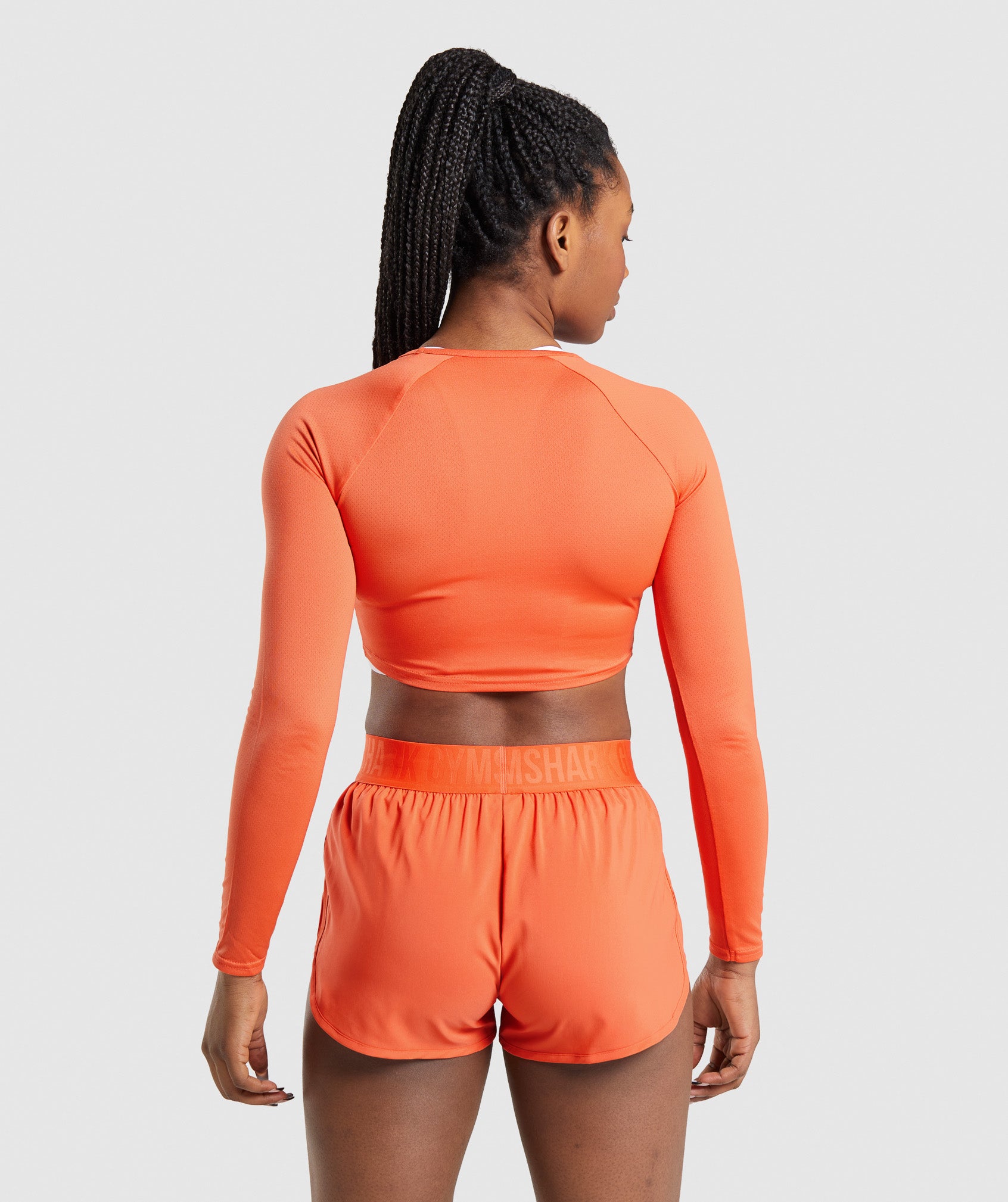 Training Long Sleeve Crop Top in Papaya Orange - view 2