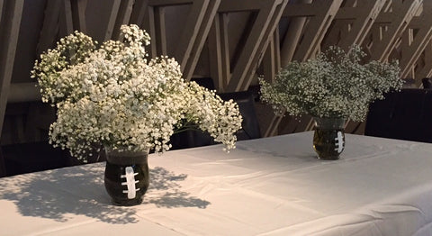 Baby's breath bouquet and football vases