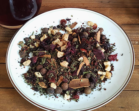 plate with Harvest tea of apples, hibiscus and cranberry