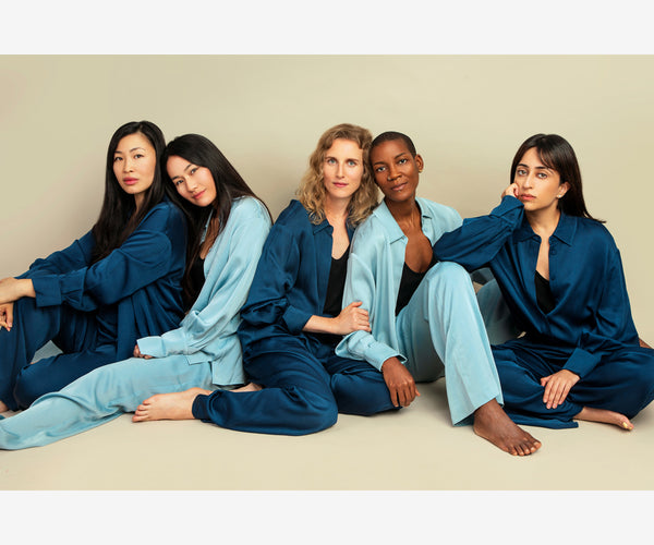 Sqwishful founder Jenn Tsang, Kim from Blue Brew Tea, Celine from Conspiracy Chocolate, Shawn, and Krystal from 852 Prints in pajamas made from up-cycled, salvaged fabrics by Róu So