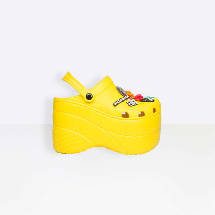 yellow crocs with pins