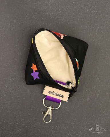 Notions Gem Key Fob open with a light colored interior