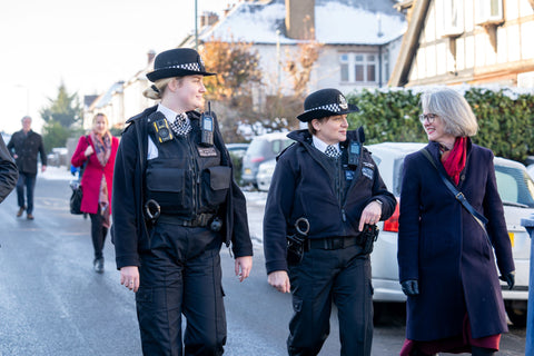 UK Female Police Officers with Two-Way Radios International Women's Day