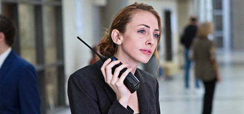 Hospitality Female with Motorola Two-Way Radio Professional Walkie Talkie 