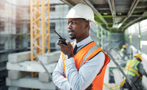 Construction man with Motorola Two-Way Radio Professional Walkie Talkie