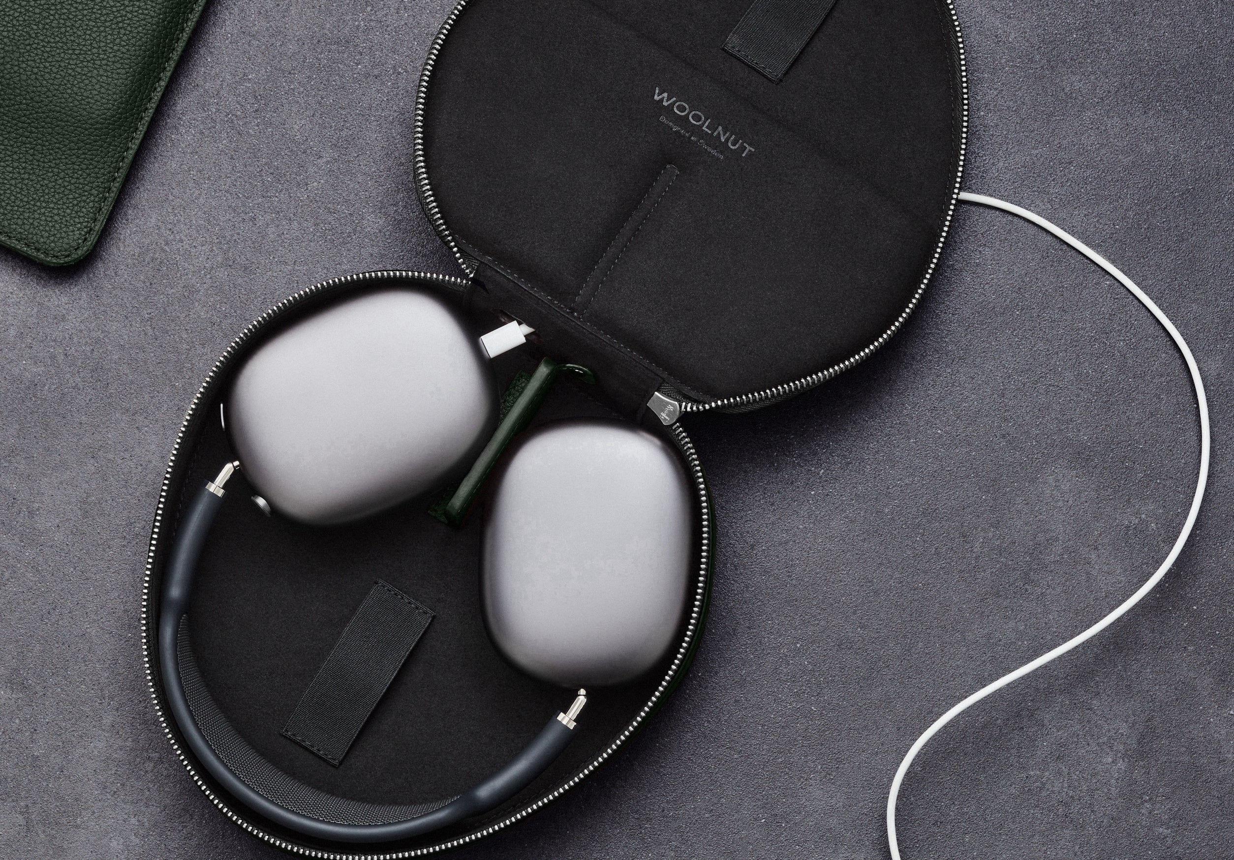 A Woolnut Case for AirPods Max on the table
