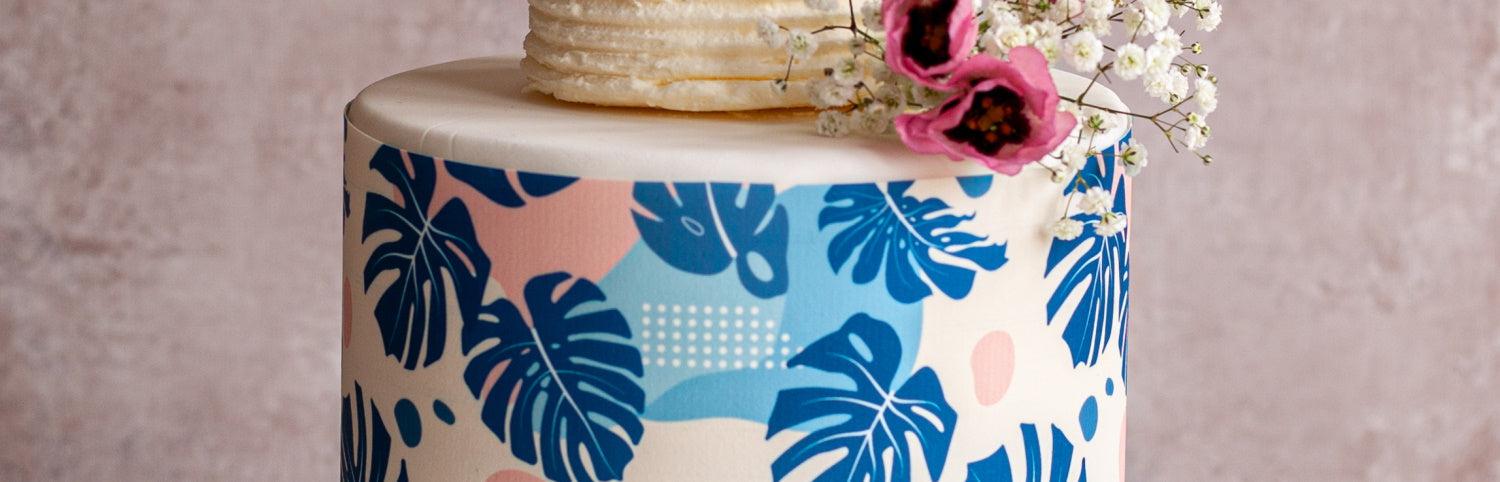 Large cake with Tropical Leaves cake wrap in pink and blue