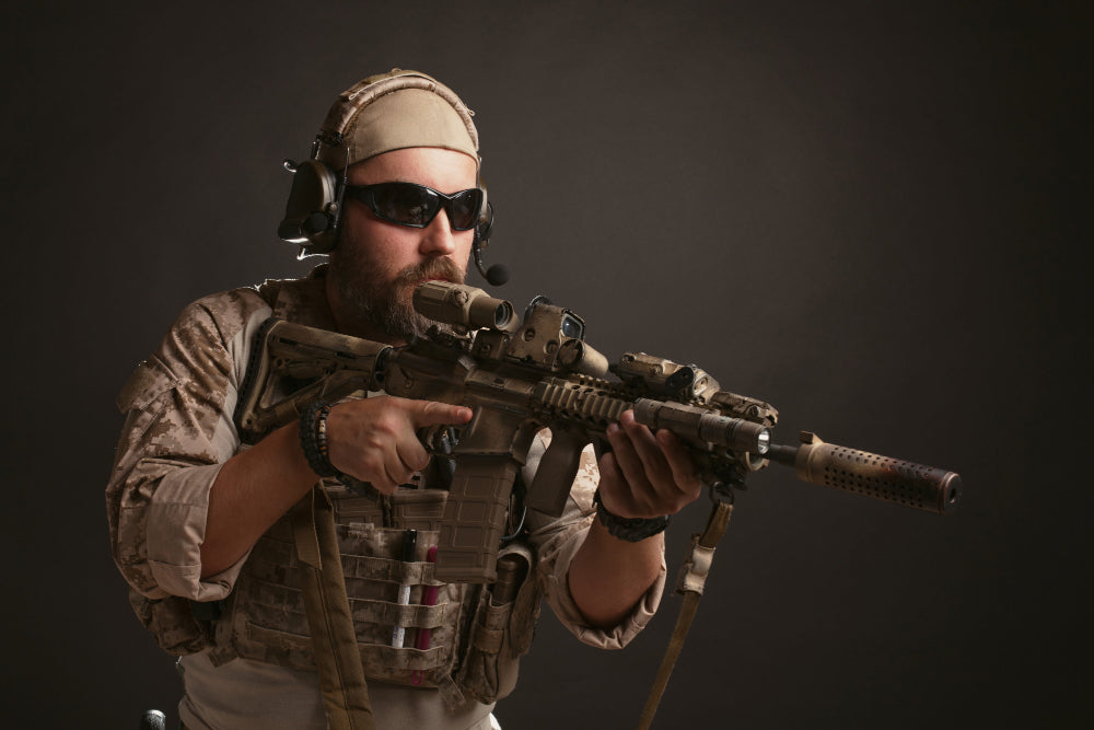 image of a man holding an airsoft gun