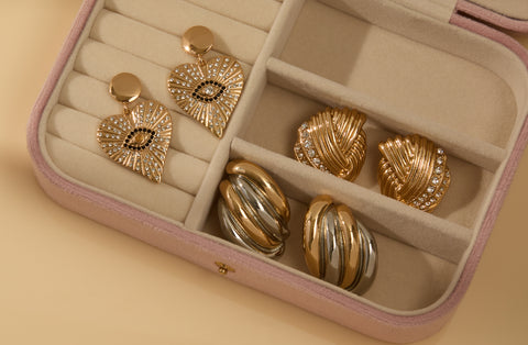 statement studs in a jewellery box