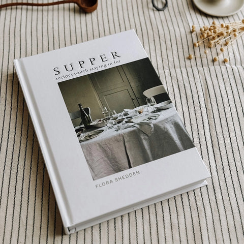 The front cover of the Cookbook Supper: Recipes worth staying in for by Flora Shedden