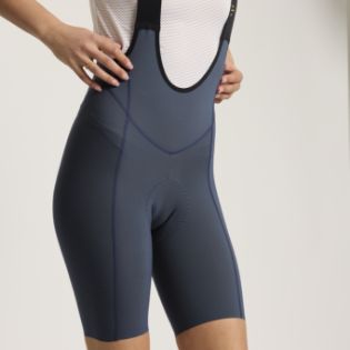 SuperFIT PRO cycling bib shorts on woman smiling