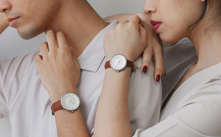 image of a couple wearing a matching watch from plain supplies