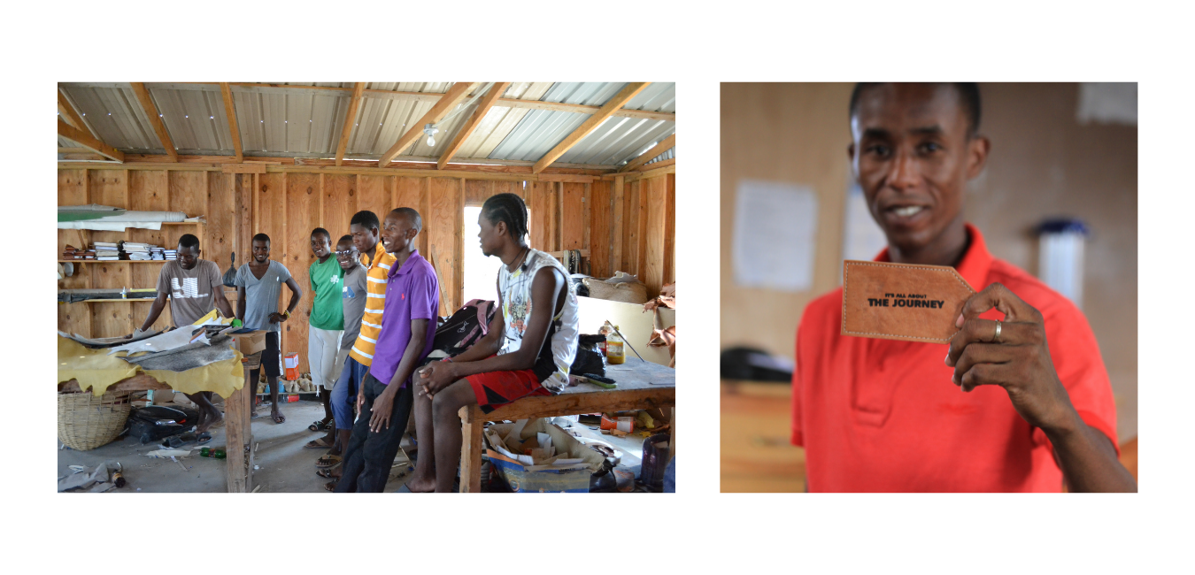 group of leather makers in the studio gathered laughing; man holding handmade, engraved tan leather luggage tag