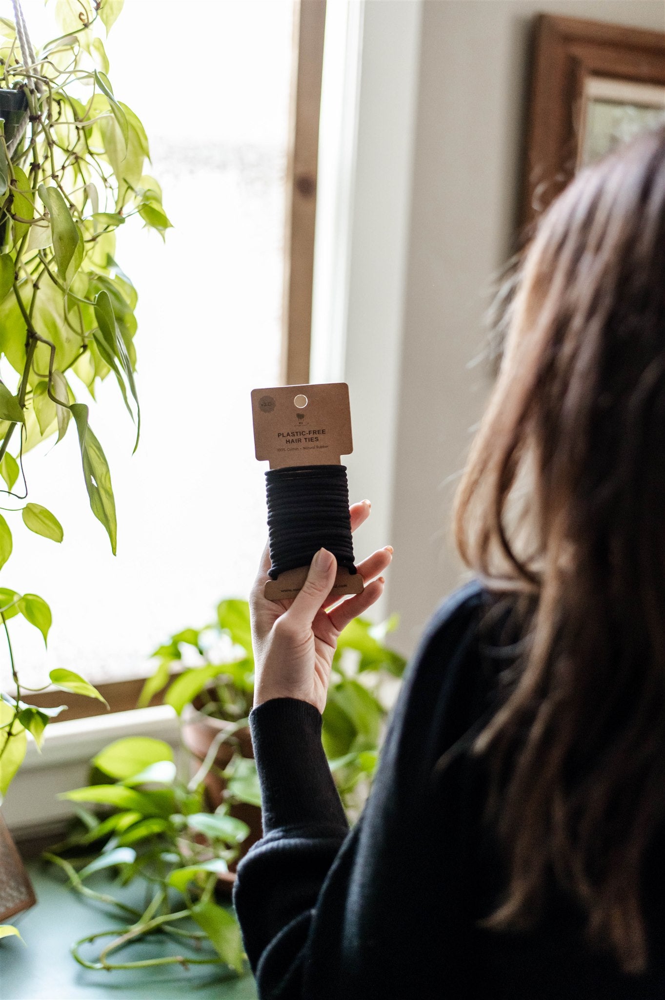 Woman holding Plastic Free Hair Ties