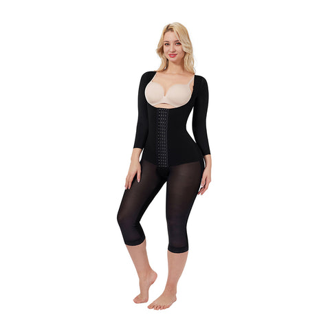 Woman wearing Iskra Black shapewear with arm shaping sleeves