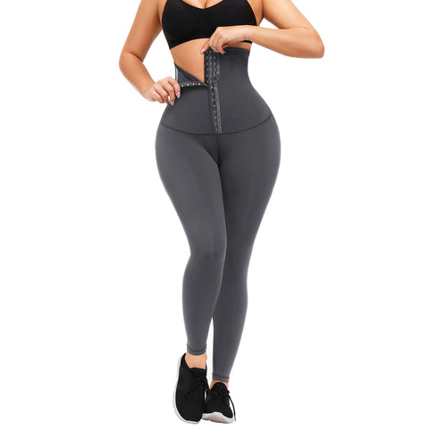 Model wearing Khloe High Waist Gray Pants, featuring a solid black color, a high waistband to cover the belly, and an adjustable buckle for a customized fit.