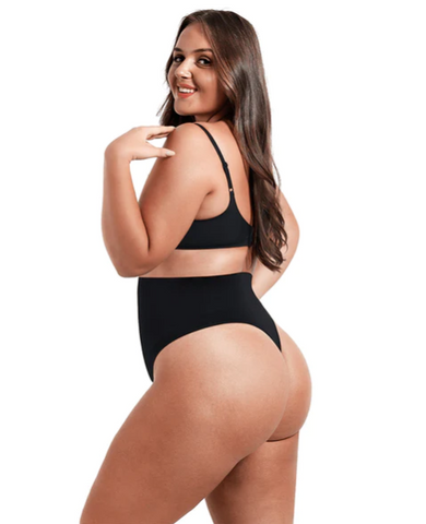 CurvQueen Anya Seamless High-Waisted Thong Shaper, a seamless shaper designed to provide high compression and correct your tummy while erasing love handles, perfect for wearing under dresses or pants and creating a smooth silhouette.
