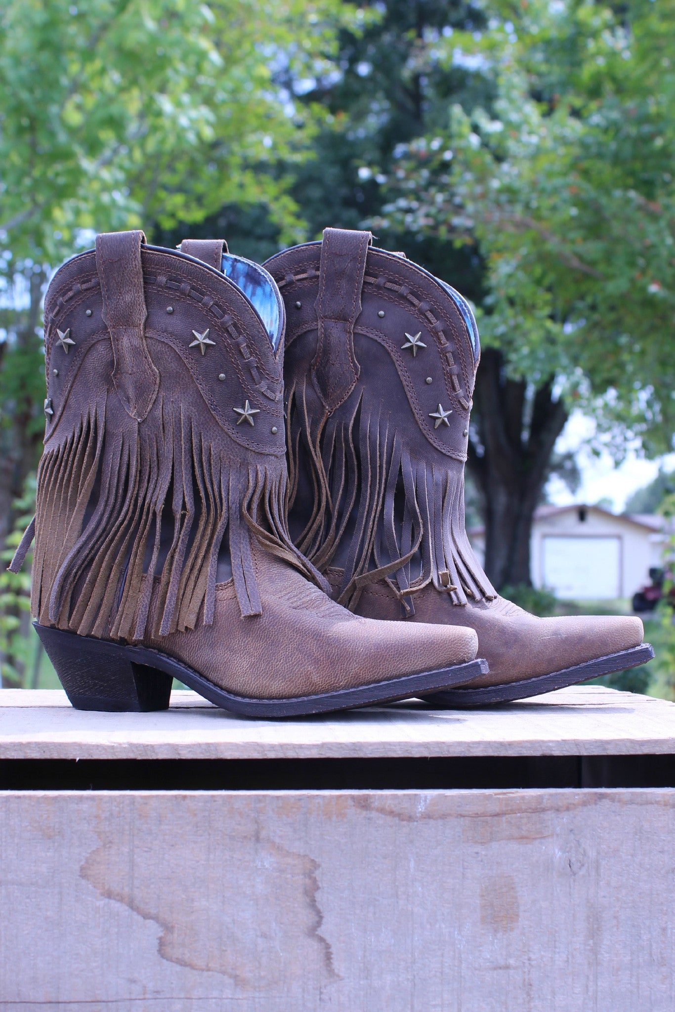 low fringe boots