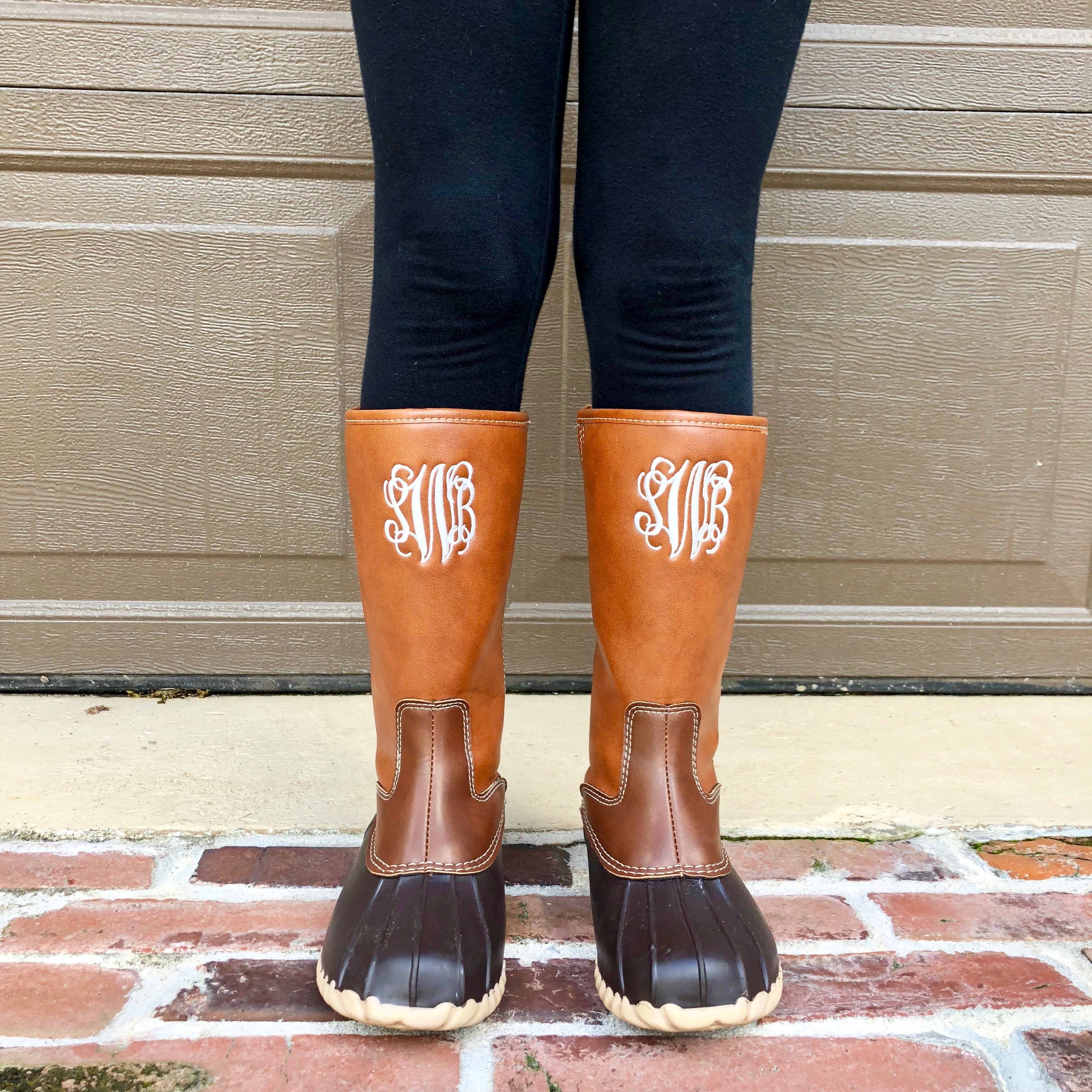 tall duck boots with monogram